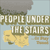 people under the stairs or stay tuned